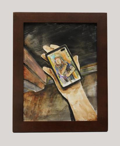 Photo of a framed watercolor painting of a hand holding a smartphone with a picture of a tattooed man holding a cat.